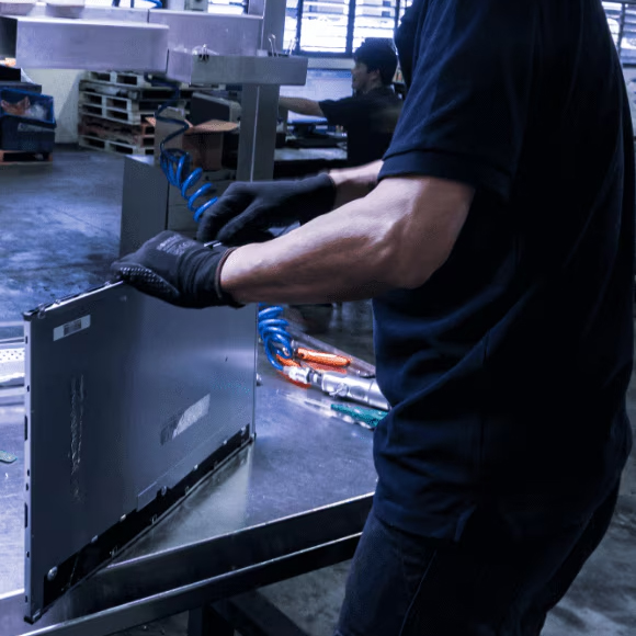 A technician working on a device