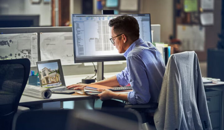 A person looking at a laptop