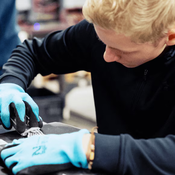A technician working on a device